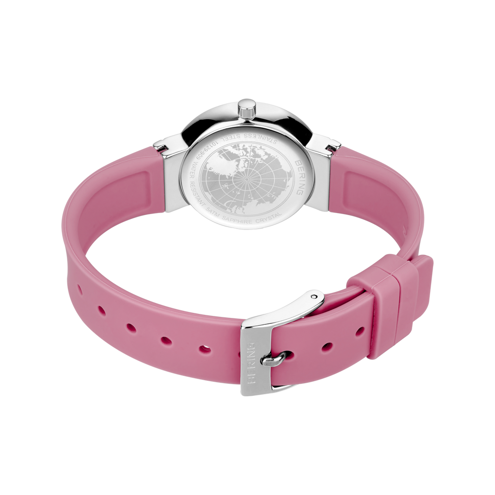 Back view of watch with pink silicone band, metal lugs, visible caseback, and clasp