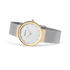 Two-tone BERING watch with white dial and mesh steel band, angled side view.