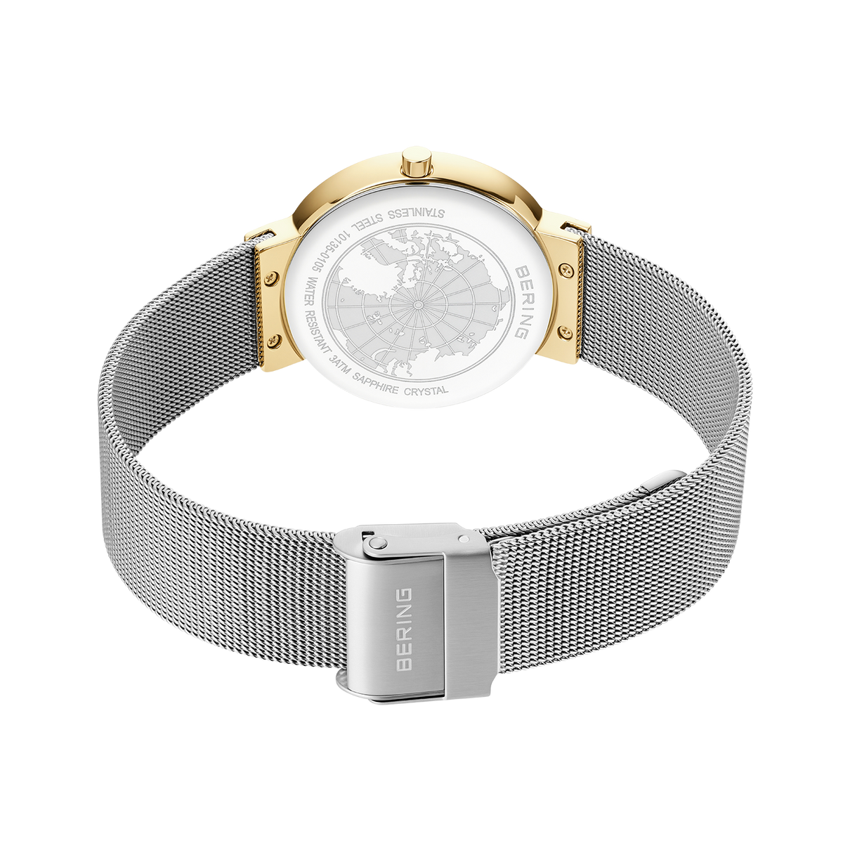 Watch caseback with engraved decoration, silver mesh strap and gold-tone lugs, rear view