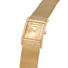 Square BERING watch with champagne dial and refined gold mesh bracelet, side-angle view