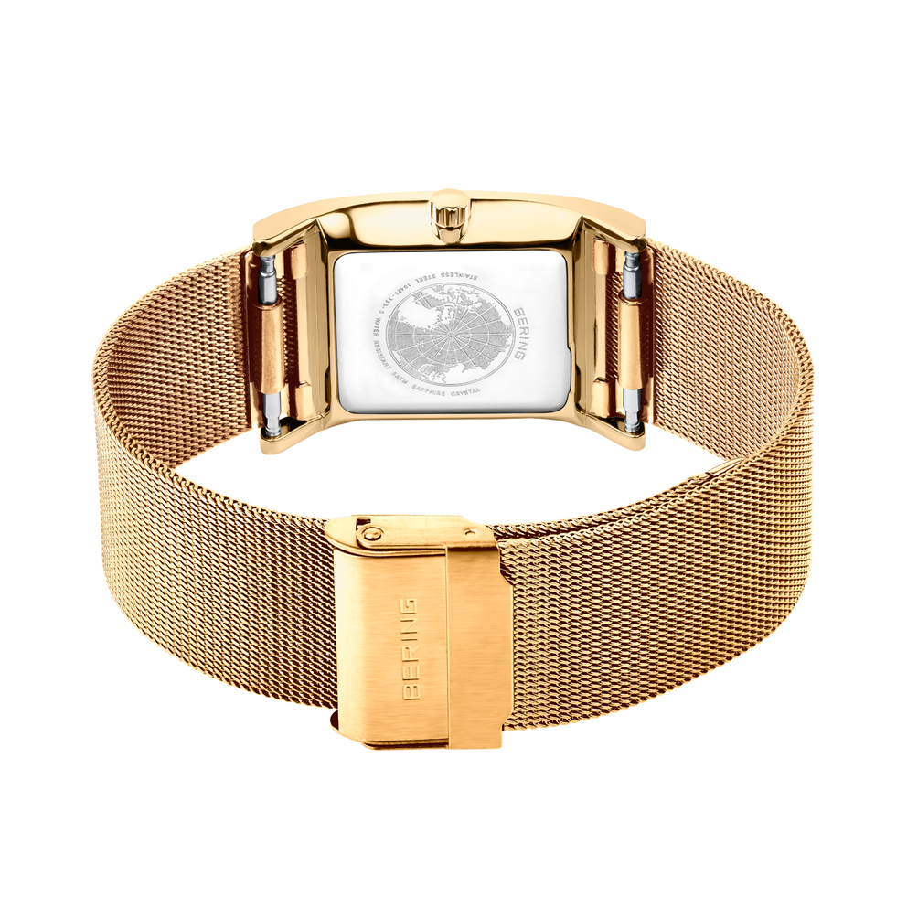 Gold-tone watch with mesh band and rectangular dial featuring circular design