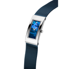 Rectangular watch with silver case and blue dial shown at angle, dark blue mesh metal strap.