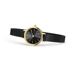 Round watch with black dial, gold-tone case, gold hour markers, and black textured strap shown at angle.