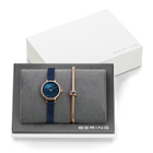 BERING gift set with rose gold and navy watch, interchangeable straps, displayed in branded presentation box