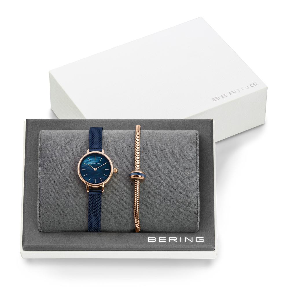 BERING gift set with rose gold and navy watch, interchangeable straps, displayed in branded presentation box