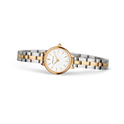 Montre BERING avec bracelet deux-tons or rose et acier, cadran blanc avec index épurés, vue de face.