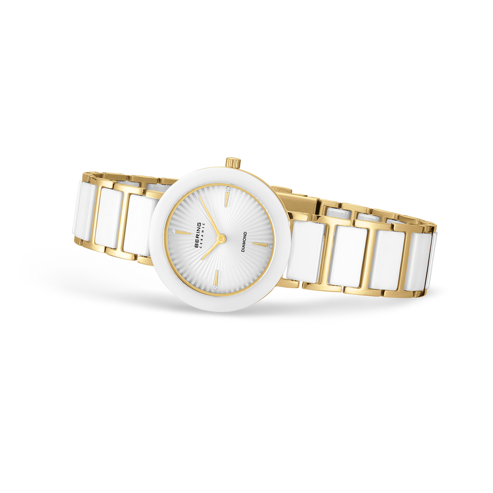 Orologio visualizzato ad angolo con cassa e cinturino bicolore oro e argento, quadrante rotondo