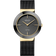 Montre-bracelet à cadran rond gris foncé, aiguilles dorées, index radiaux et bracelet maille noire.