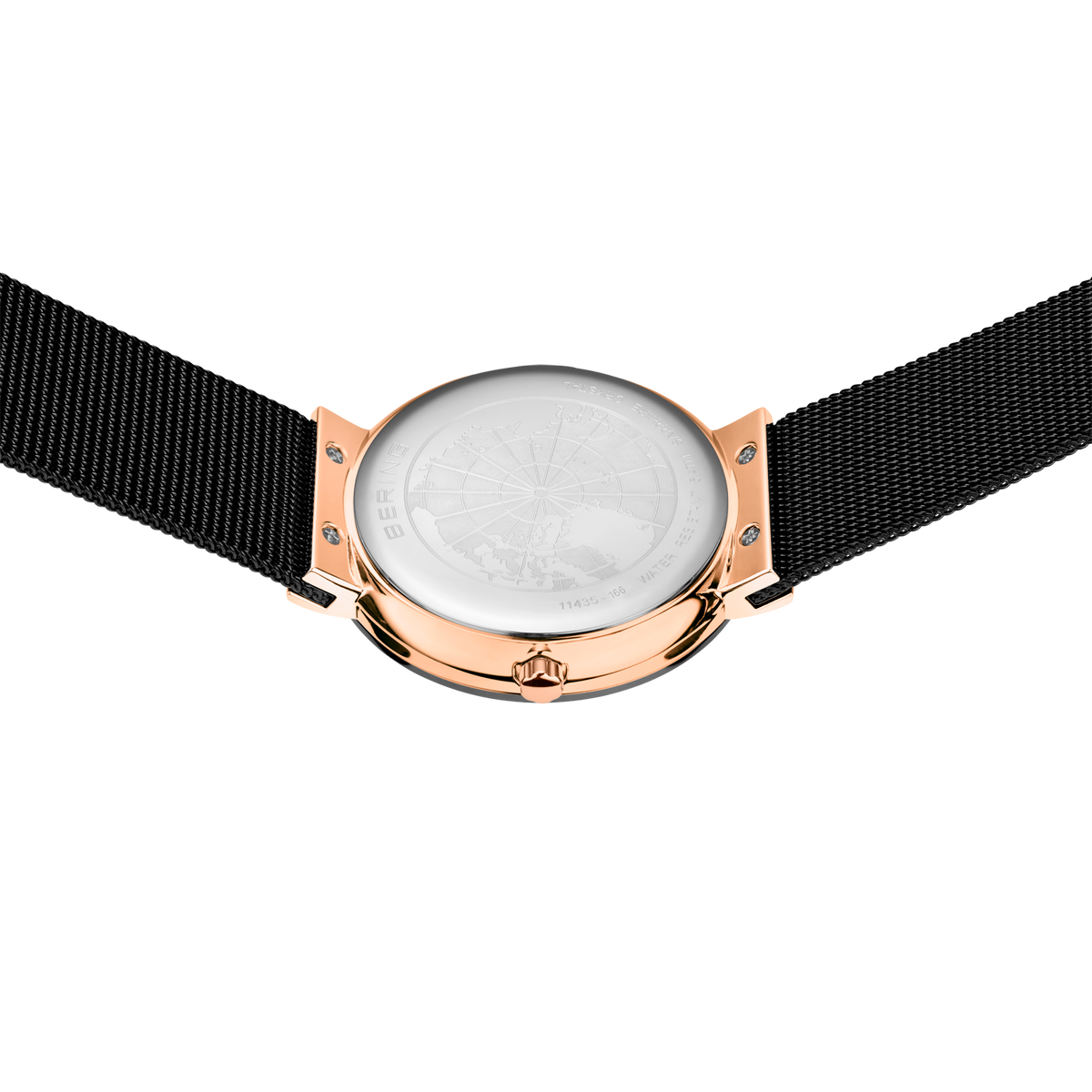 Orologio tondo in oro rosa con quadrante argentato e cinturino in tessuto nero, visto dall'alto