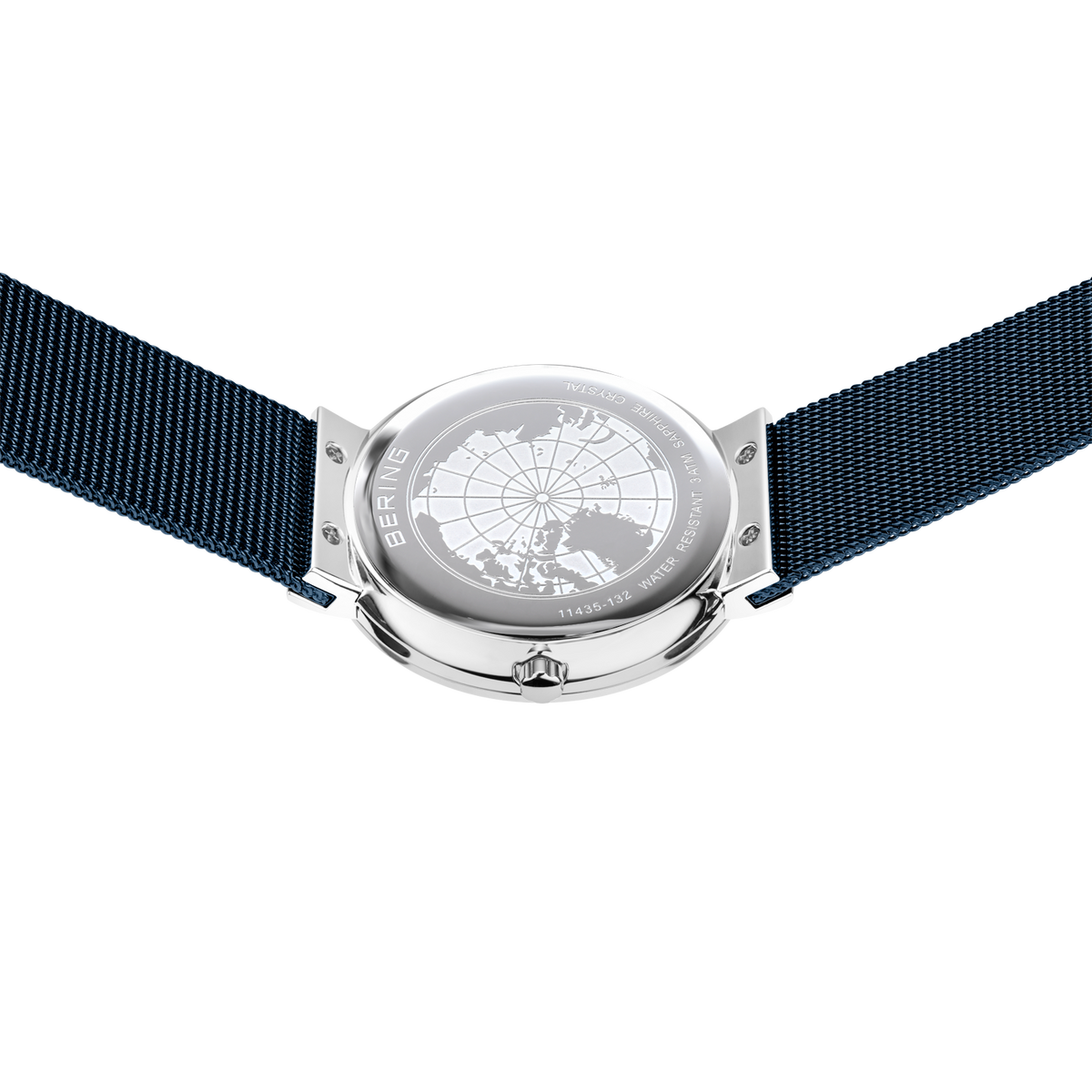 Orologio fotografato dall'alto con cinturino in tessuto blu navy esteso su entrambi i lati, design globo visibile.