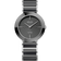 Orologio BERING rotondo con cassa grigio scuro, quadrante a raggiera e bracciale in metallo con maglie nere e argentate.