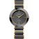 Orologio bicolore nero e oro con quadrante a motivo radiale, lancette dorate e bracciale a maglie.
