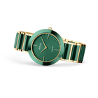 Orologio turchese con quadrante a raggi e cinturino bicolore, vista laterale