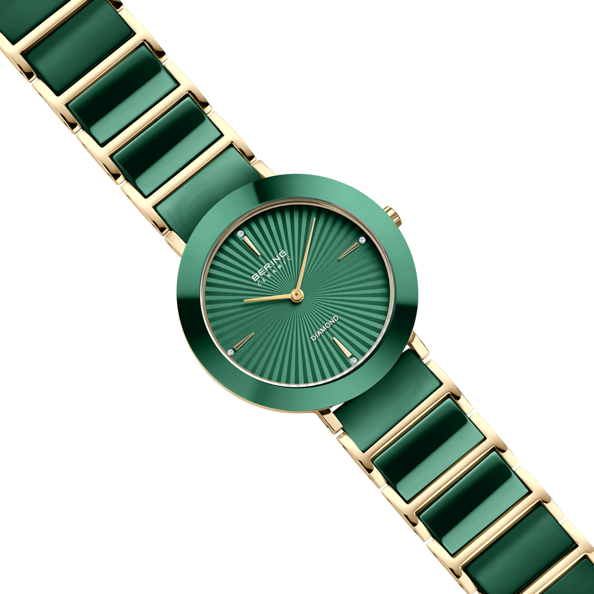 Orologio rotondo verde con quadrante a raggi, lancette dorate e cinturino verde e dorato a maglie.