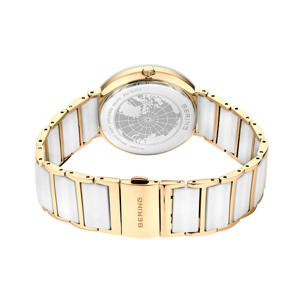 Watch back view with two-tone bracelet of alternating white ceramic and gold-tone links, oval dial visible from reverse angle.
