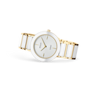 Gold and white ceramic wristwatch with radial dial indices, angled three-quarter view