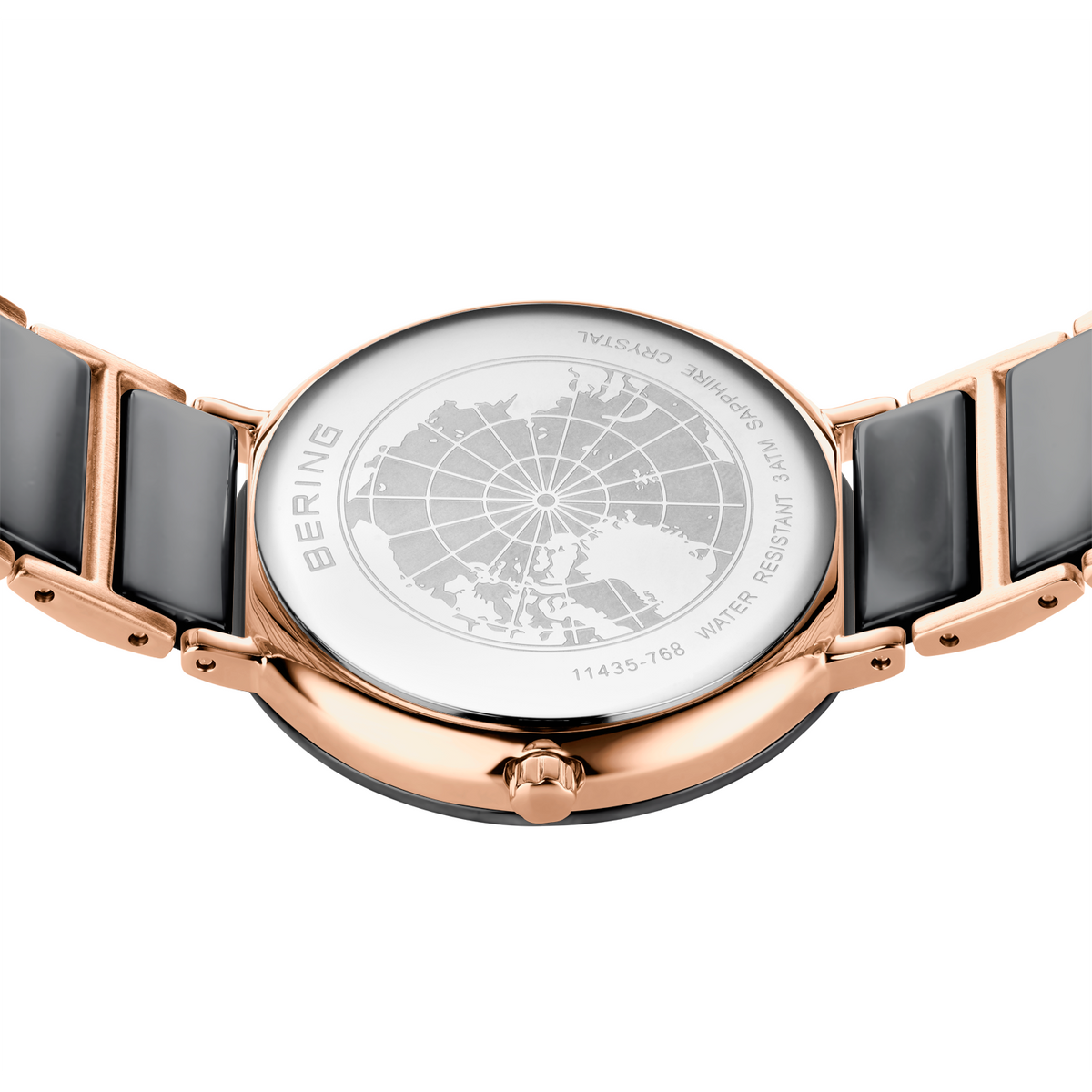 Orologio in oro rosa con cinturino nero, quadrante bianco con mappa mondiale incisa, vista posteriore