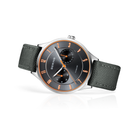BERING watch with black dial and orange details, mesh strap laid out flat