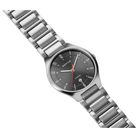 Gray dial wristwatch with steel link bracelet, angled view showing bracelet and case.