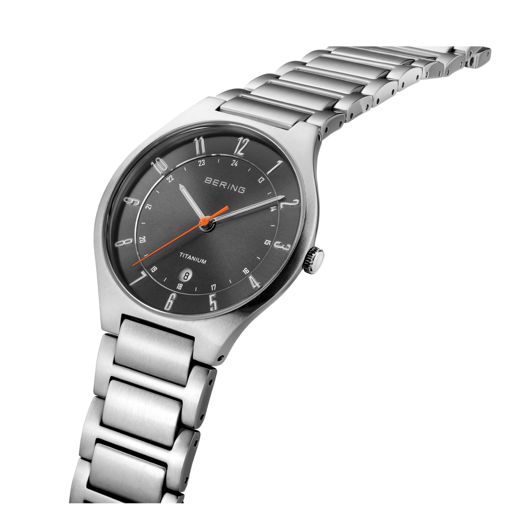 BERING watch 11739-772 with black dial and silver metal bracelet displayed at an angle