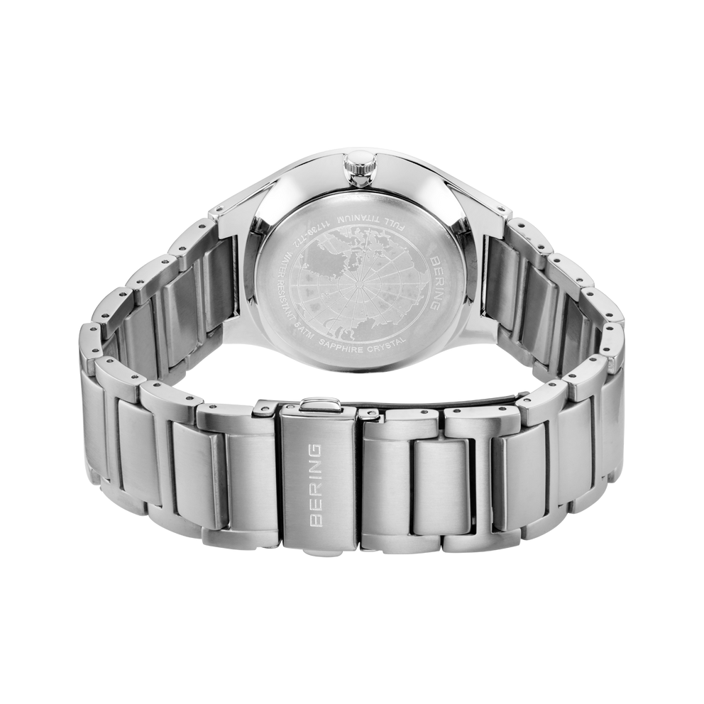 Back view of silver metal wristwatch with linked bracelet band