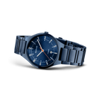 Dark blue steel watch with matching bracelet and blue dial with white hour markers, shown from an angle