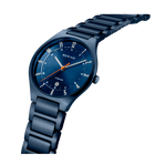BERING wristwatch with navy dial and metal bracelet, angled side view.