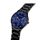 BERING chronograph watch with dark blue dial and black metal bracelet, angled view.