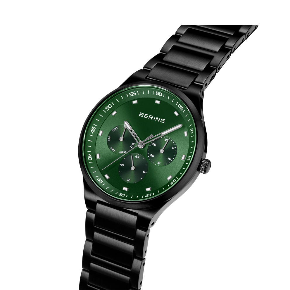 BERING watch with black metal band and green dial, angled view showing bracelet and face