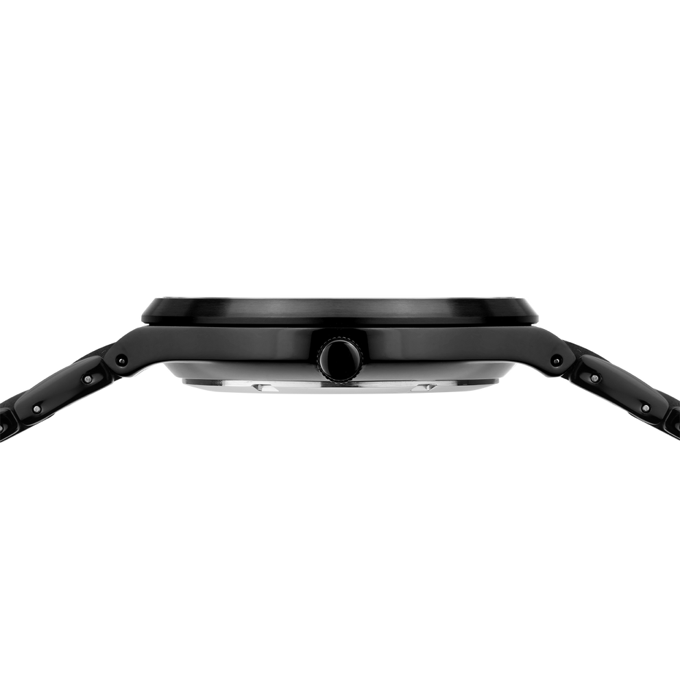 Black wristwatch with round dial and angular band, shown from the side.