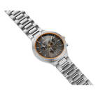 Wristwatch with dark dial, orange accents, and steel bracelet, shown at an angled view.
