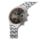 Stainless steel watch with silver bracelet, black chronograph dial, and orange bezel accent—angled side profile view.