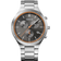 BERING chronograph wristwatch, stainless steel case and bracelet, black dial with orange accents and subdials, front view.