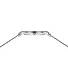 Steel watch case and mesh band viewed from the top edge, showing the lugs and band connection points