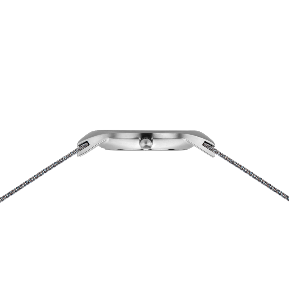 Steel watch case and mesh band viewed from the top edge, showing the lugs and band connection points