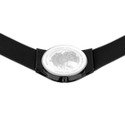 Wristwatch with round dial featuring engraved world map pattern, viewed from above with black textile strap visible on both sides.