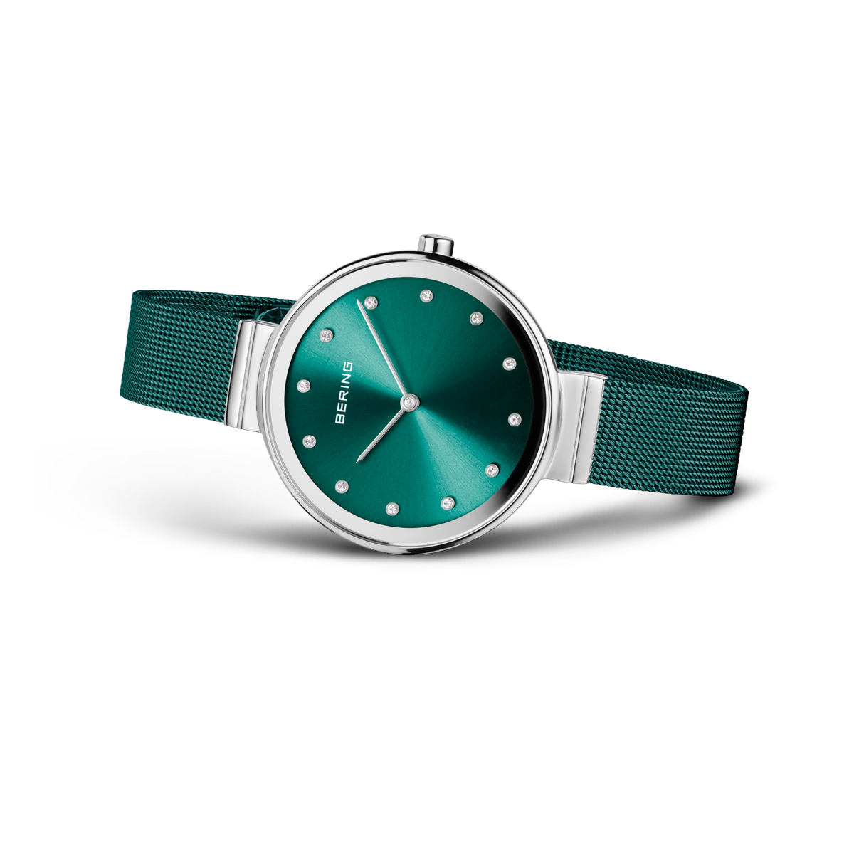 BERING wristwatch with teal dial, silver case, and teal mesh strap shown at three-quarter angle.