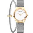 BERING wristwatch with gold case, white dial, diamond hour markers, mesh bracelet, and matching mesh bracelet