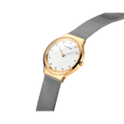 BERING watch with rose-gold case, white dial with dot hour markers, and gray mesh bracelet shown at an angle.