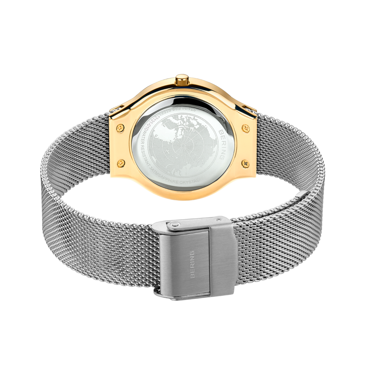 Back view of wristwatch with silver mesh band, gold case, transparent case back, and band clasp.