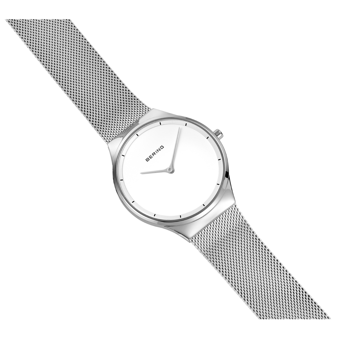 BERING watch at diagonal angle showing round face with minimal dial markings and patterned band