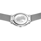 Silver watch with minimalist dial displayed flat-lay with mesh bracelet extending to both sides