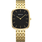 Rectangular BERING watch with gold-tone case and bracelet, black dial with gold hour markers and hands