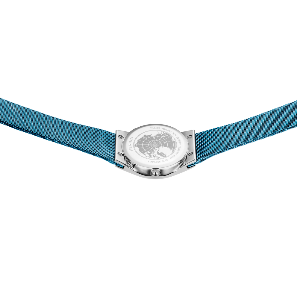 Montre à boîte argent, cadran gris et bracelet en tissu teal, vue de dessus