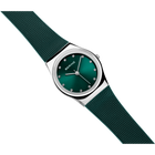 BERING 12927-808 wristwatch with teal dial and silvered case, shown at diagonal angle with matching teal fabric strap.