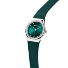 BERING watch 12927-808, angled side view with teal dial, diamond indices, and matching mesh strap.
