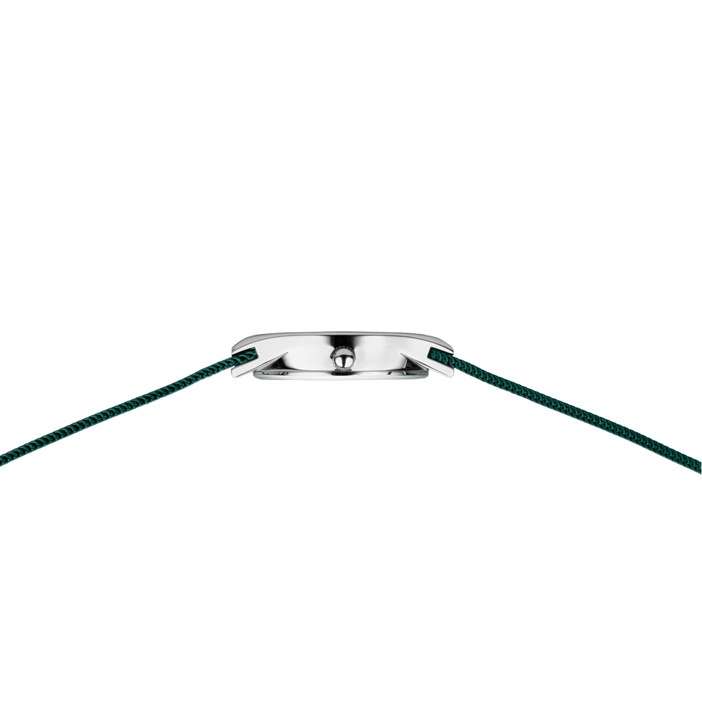 Top-down view of BERING 12927-808 wristwatch showing polished silver case and dark textured fabric strap