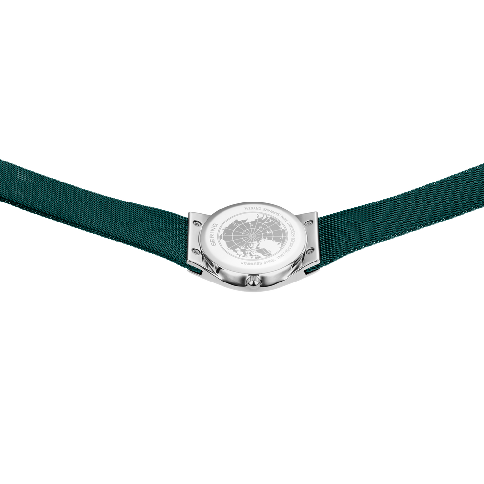 BERING watch case with dark green ribbed textile strap, viewed from bottom showing silver-tone back.