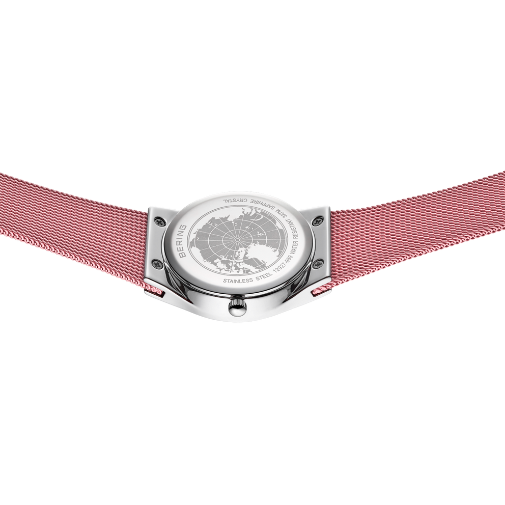 Silver-tone watch case with textured dial and pink fabric mesh strap