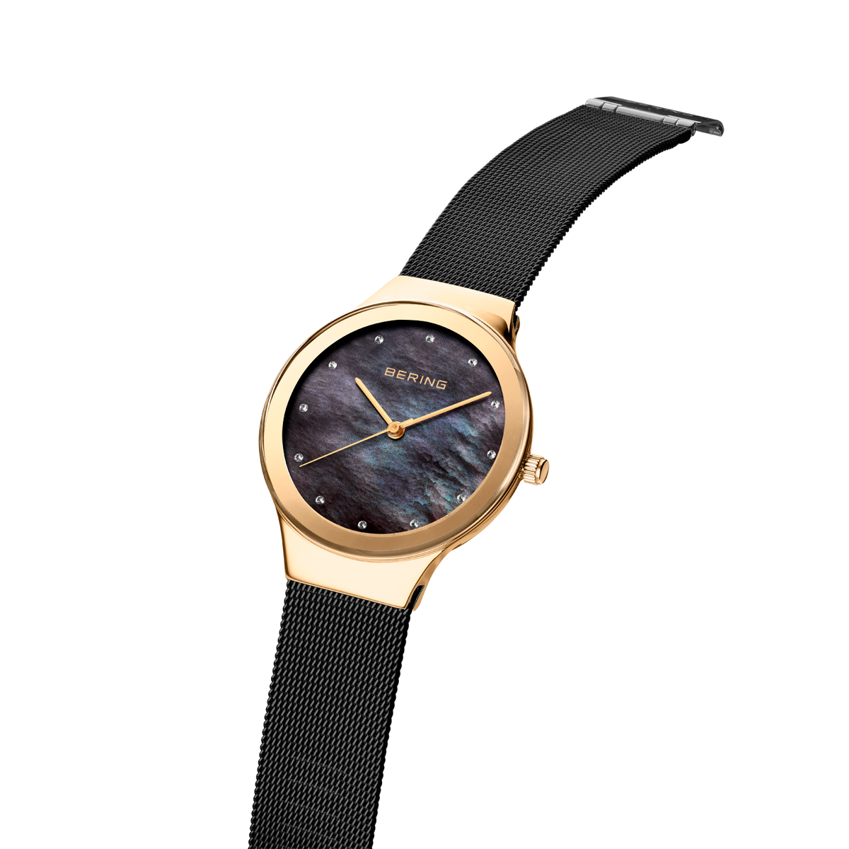 BERING wristwatch with rose-gold case, dark blue dial, and black mesh strap, shown at three-quarter angle.